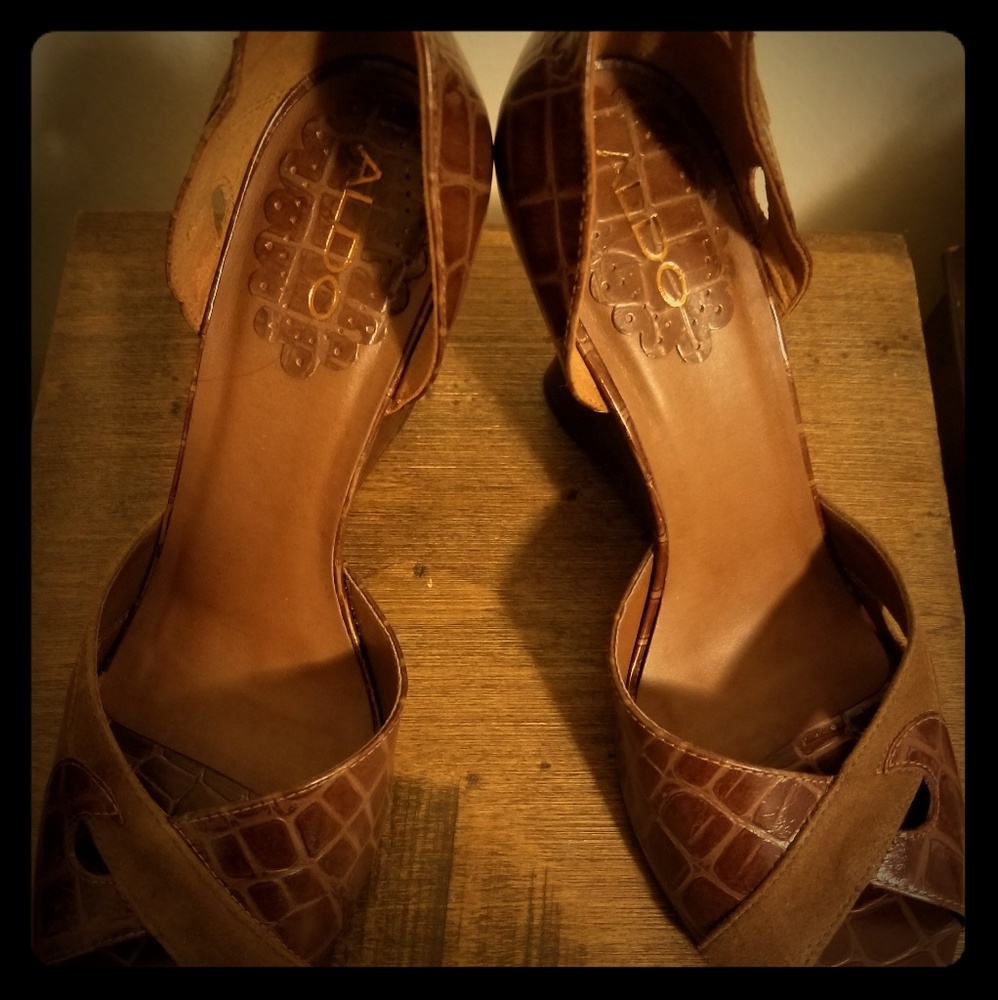 ALDO Brown Leather Animal print wedge sandals.